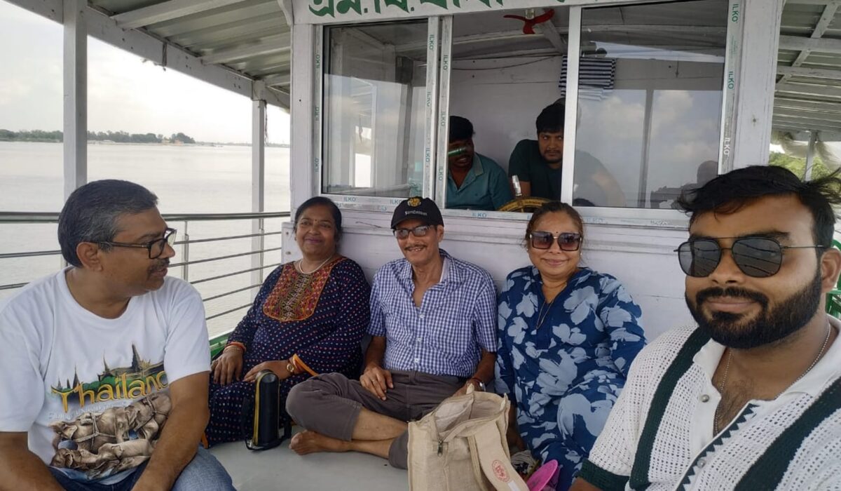 Guests relaxing together aboard a Sundarban tour boat